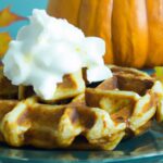 Cozy Pumpkin Spice Waffles Drizzled with Maple Syrup Magic