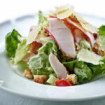 Decoding Caesar Salad: Origins and Classic Recipe Insights