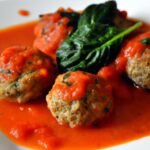 Zesty Lamb Meatballs Simmered in Spicy Tomato Sauce