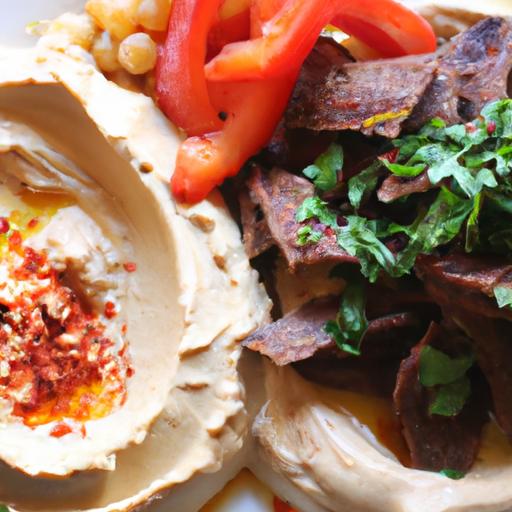 Tender Slow-Cooked Beef Shawarma Served with Creamy Hummus