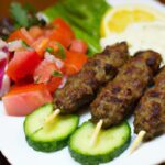 Savor the Flavors: Lamb Kofta with Fresh Tomato Cucumber Salad