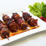 Savoring Greed: The Allure of Lamb on a Stick Delight