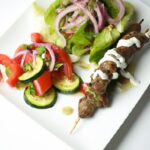 Savor the Flavors: Lamb Kebab with Pita & Fresh Salad