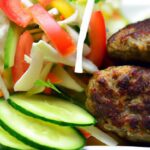 Savor Lamb Kofta Paired with Fresh Tomato Cucumber Salad